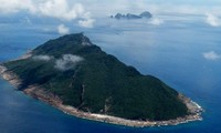 Japan, China experts urge government dialogue on disputed island